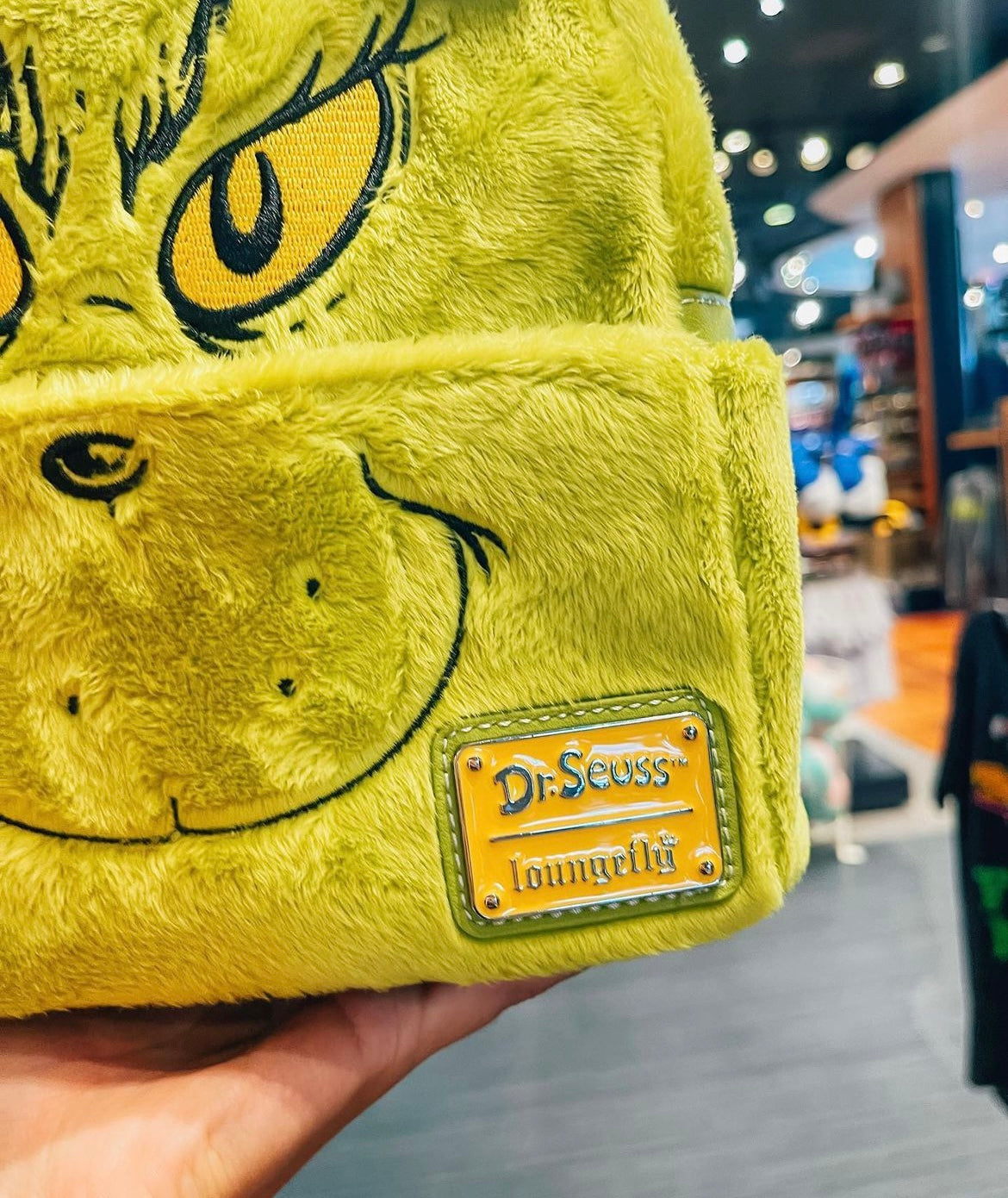 Bolsa Lounge Fly Grinch Universal Studios